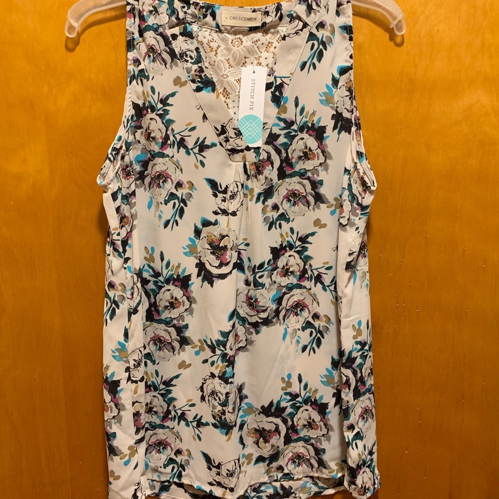Floral blouse with lace detail on back